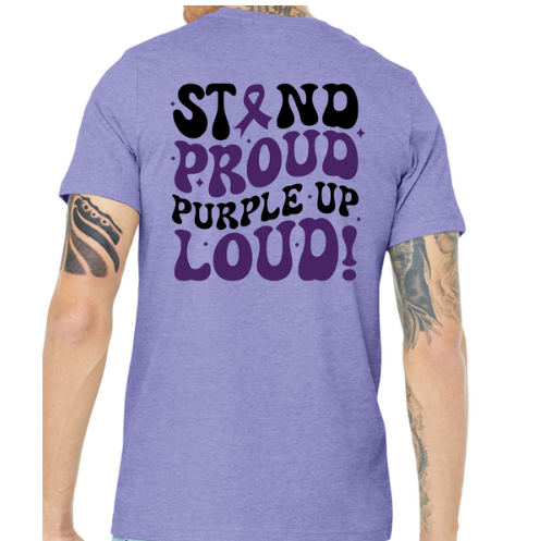Back of a purple shirt on man with tatoo designs on arms. 