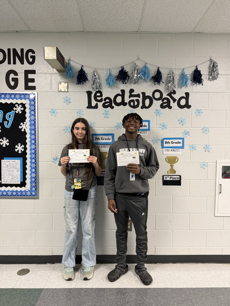 students holding certificates 
