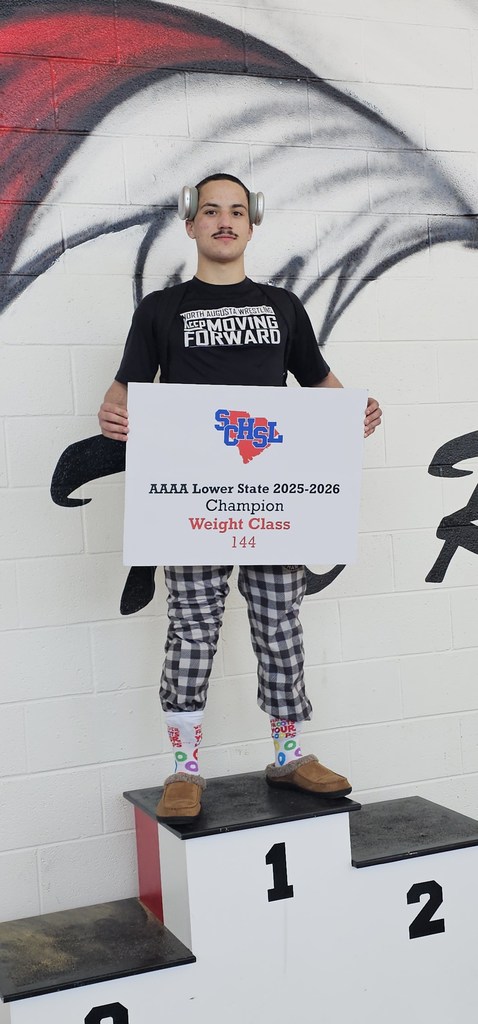 Male Wrestler with headphones.