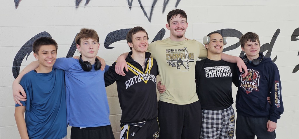 6 male wrestlers.