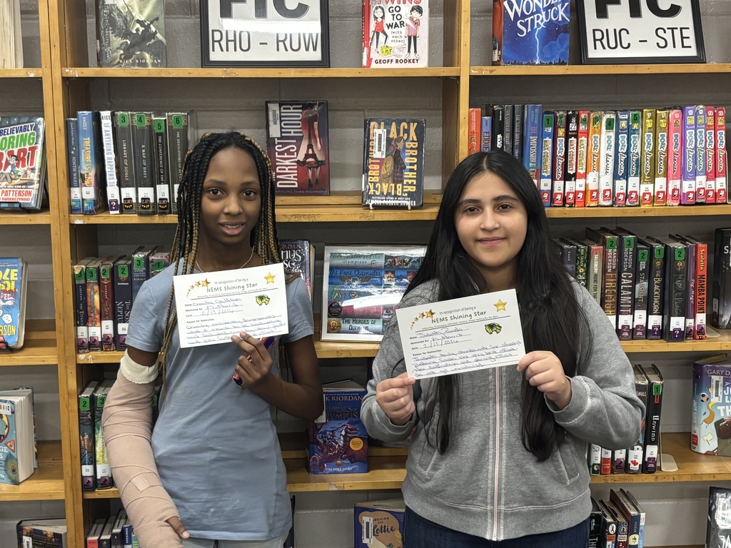 students holding certificates