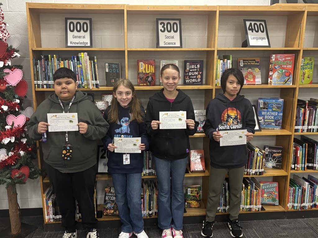 students holding certificates