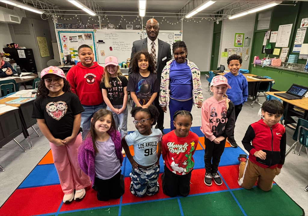 Dr. Murphy Reading to class