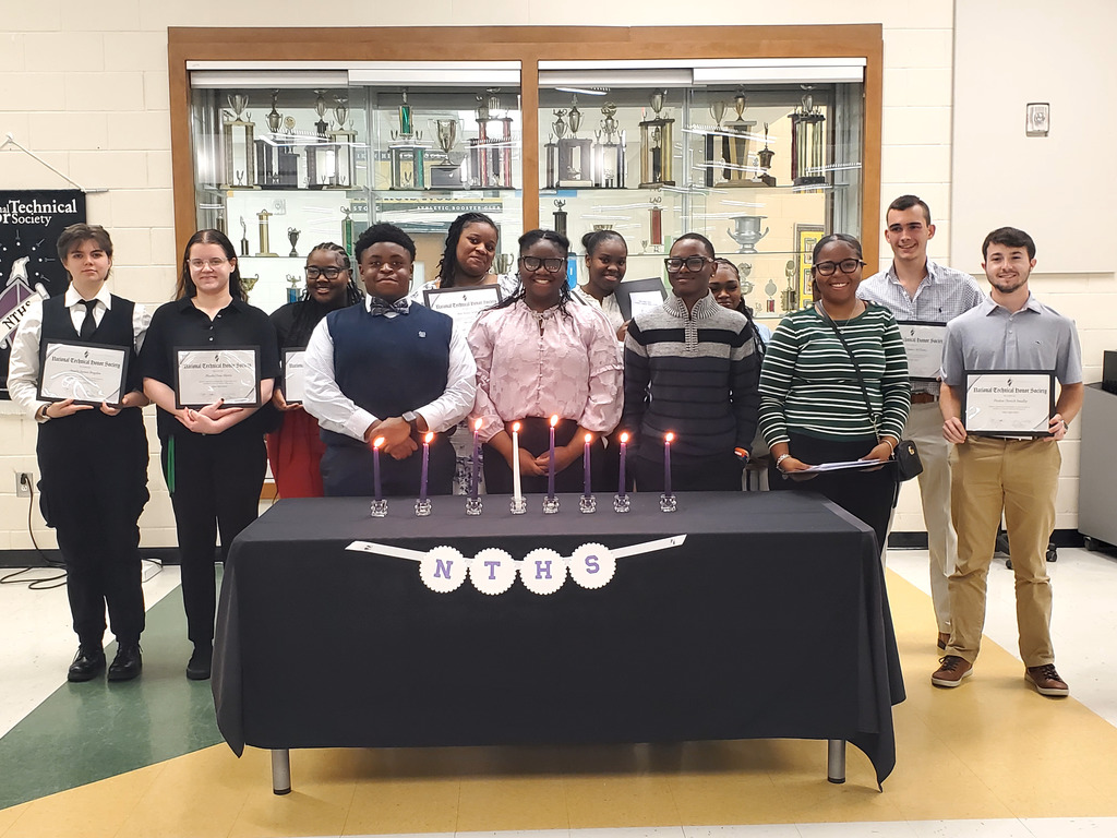 Students holding certificates