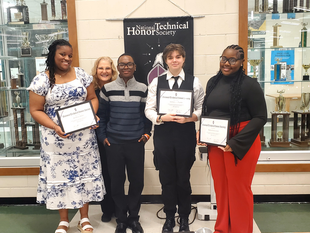 Students holding certificates