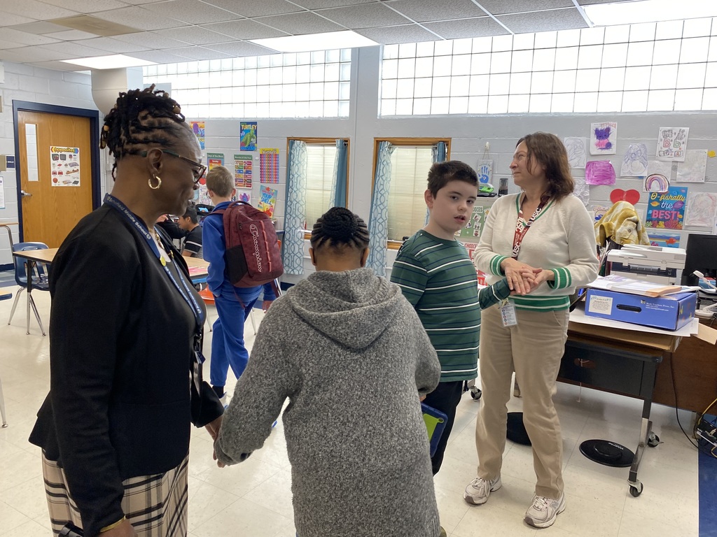 Woman dancing with students