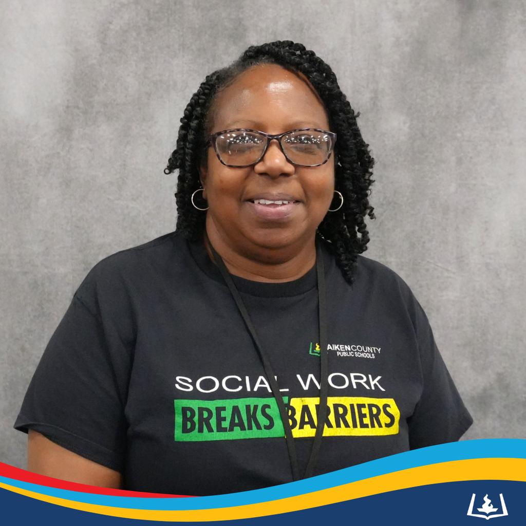 Bobbie smiling in social work t-shirt.