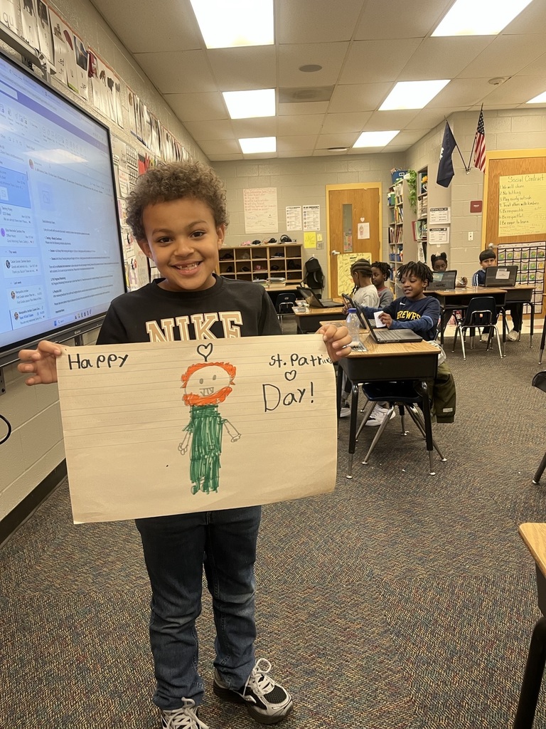 North Aiken Elementary School student shows off leprechaun drawing.