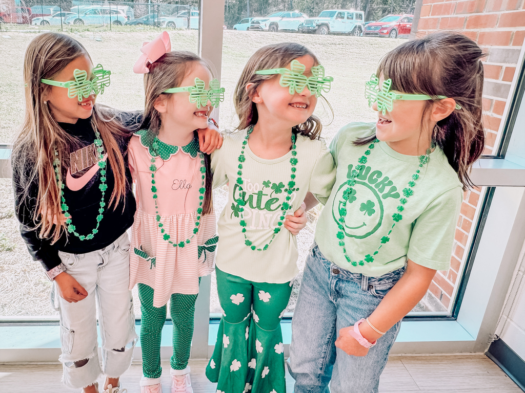 Hammond Hill students rock shamrock glasses and green attire.