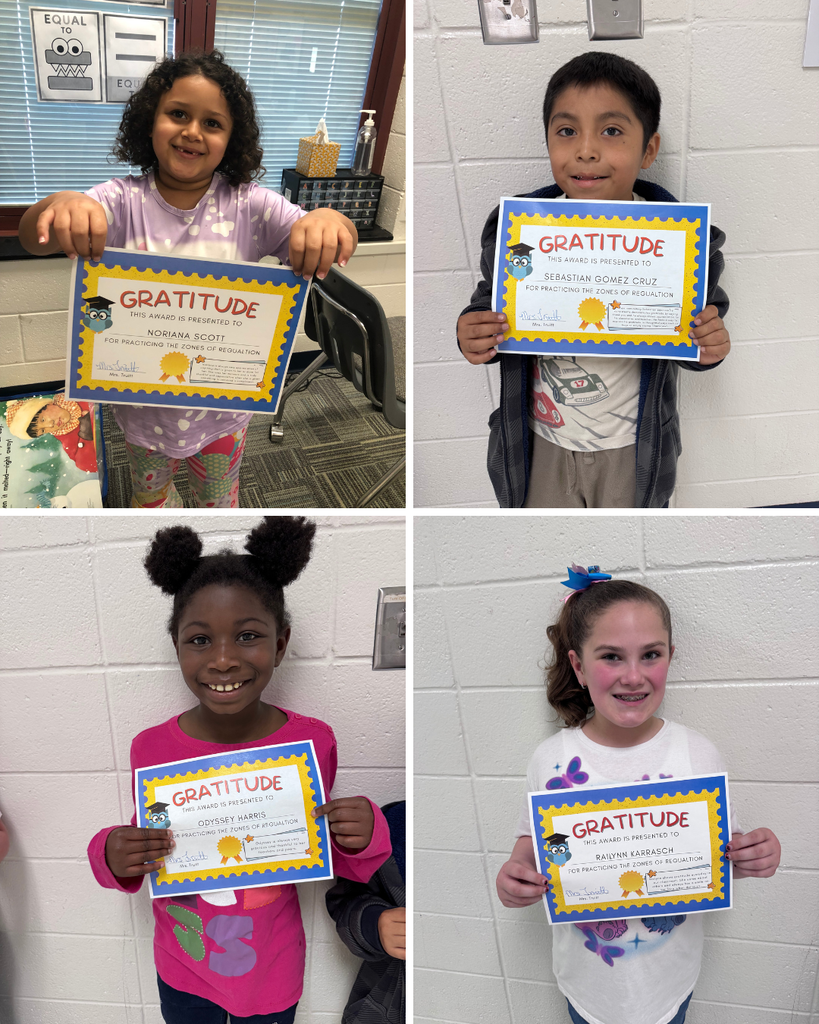 students with gratitude sign