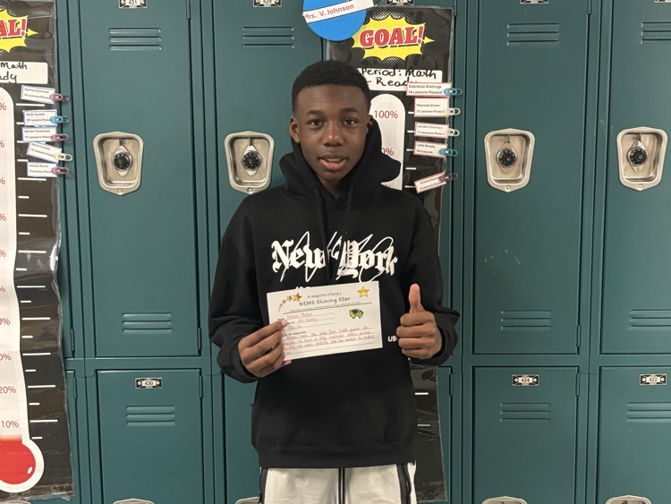 student posing with certificate 