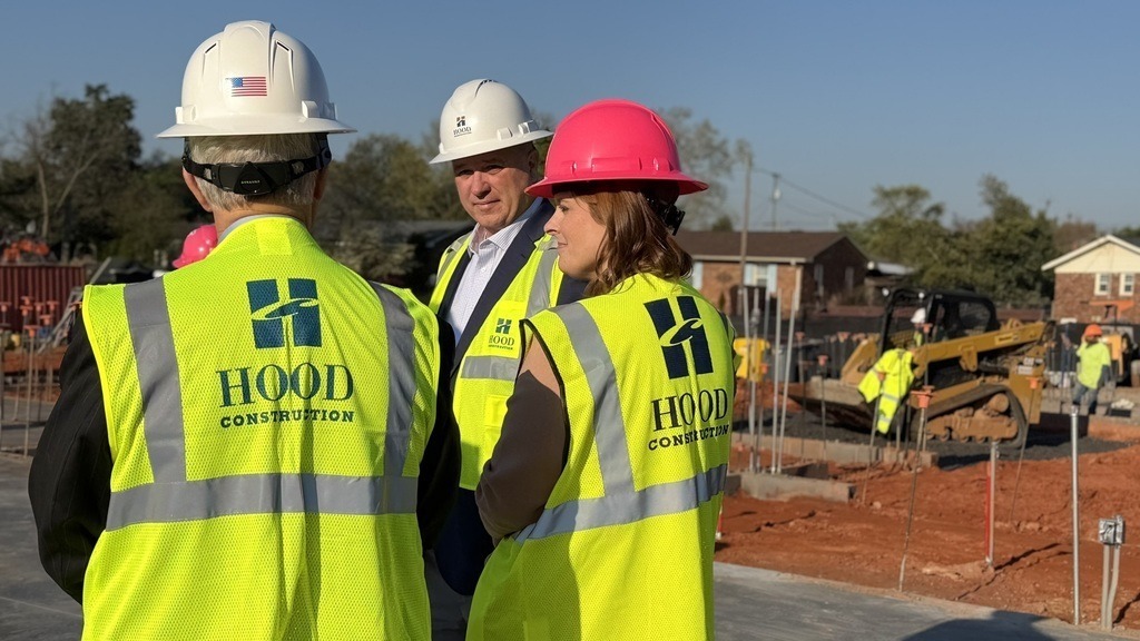 Principal of Belvedere talking with construction.