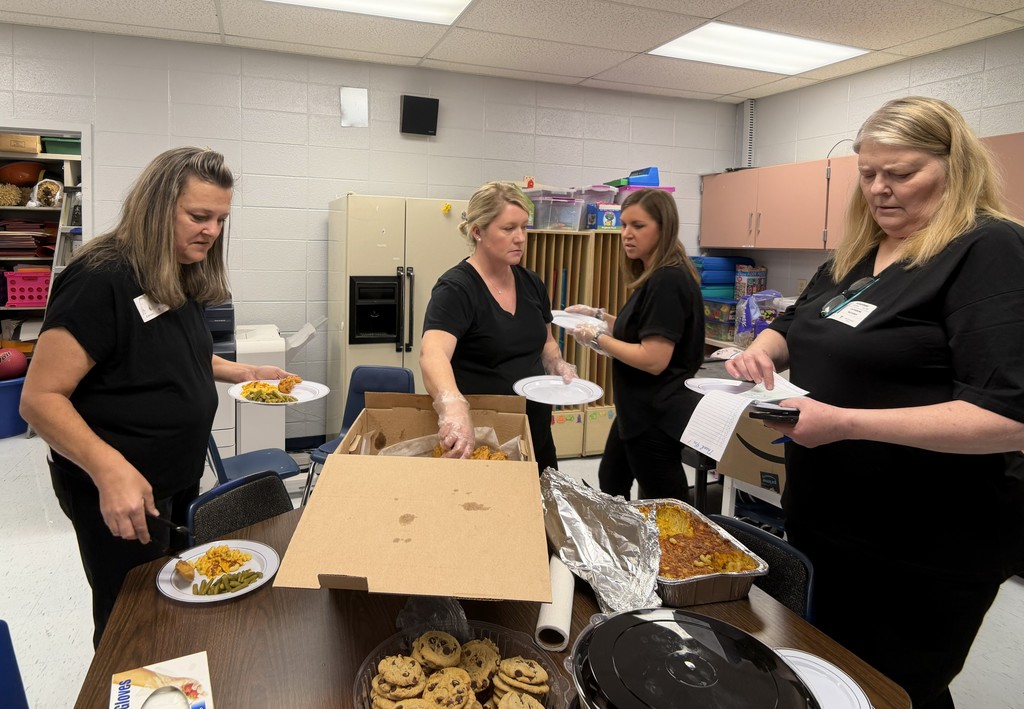 Parents help serve and provide meals.