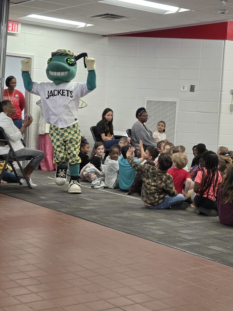 Mascot running through crowd.