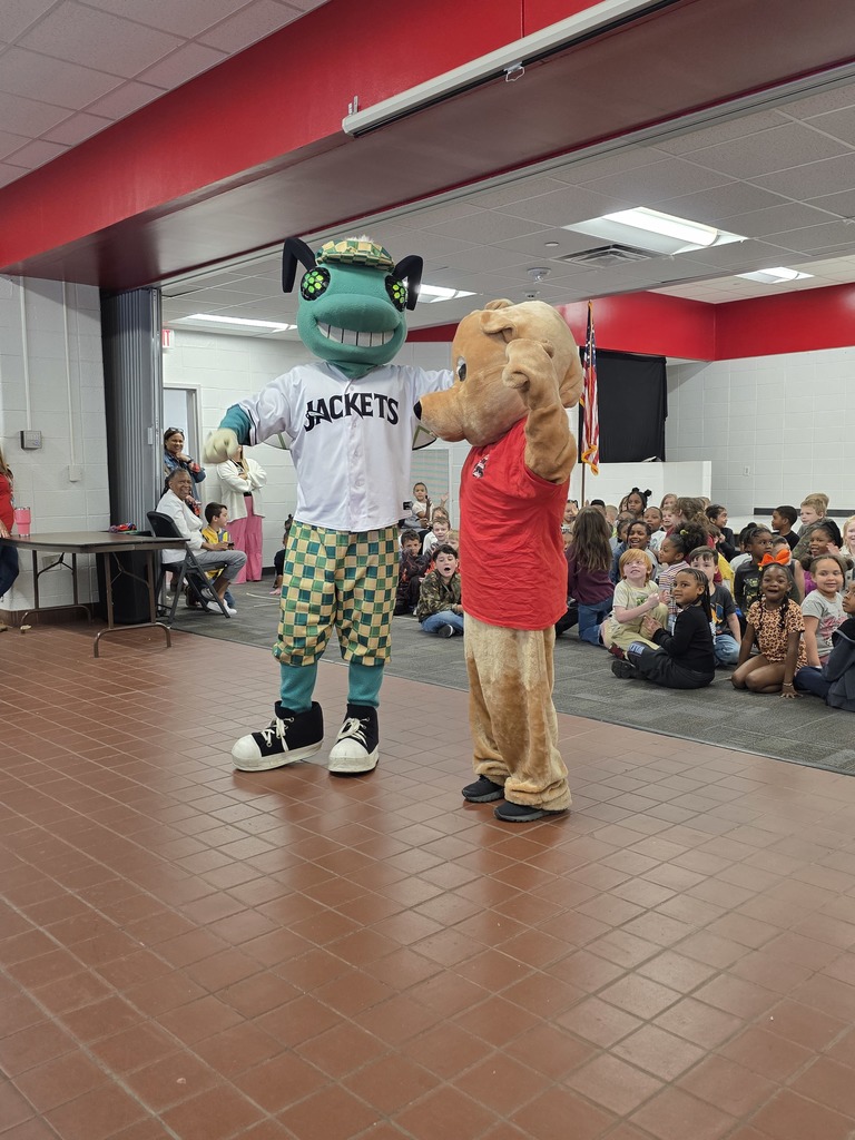 School mascots in front of crowd.