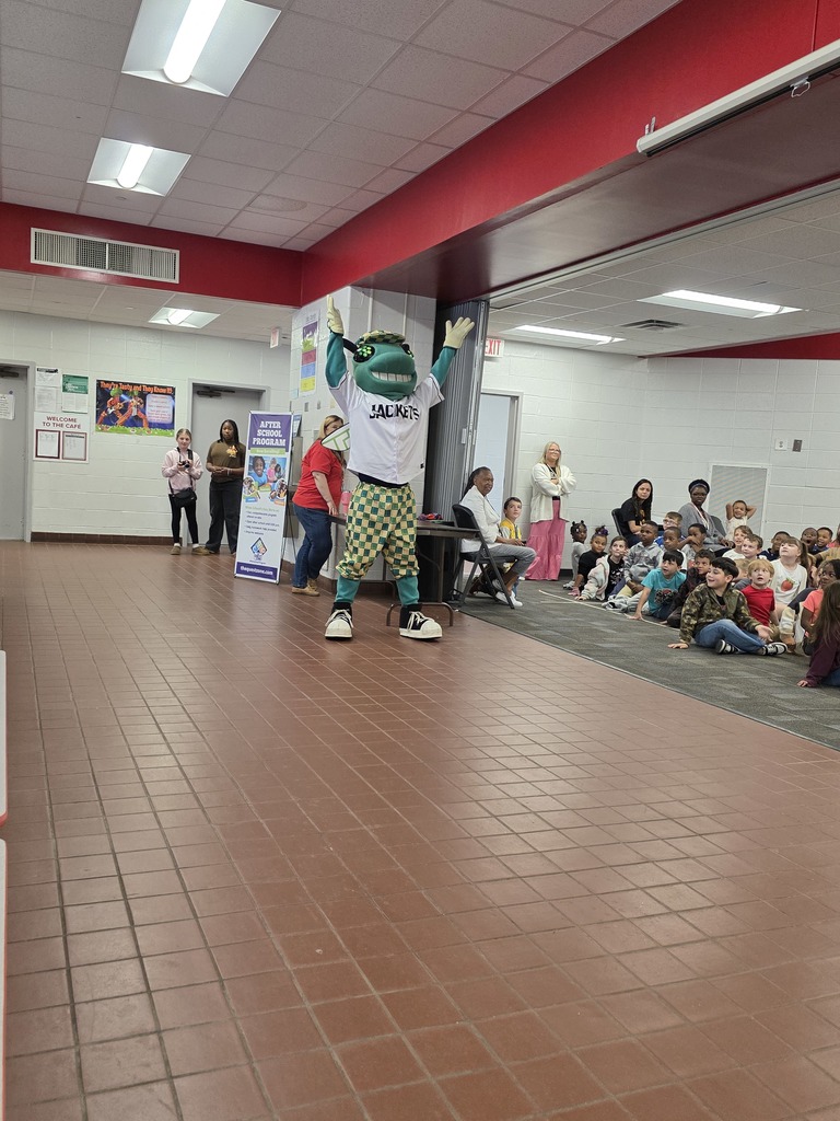 Mascot running through crowd.