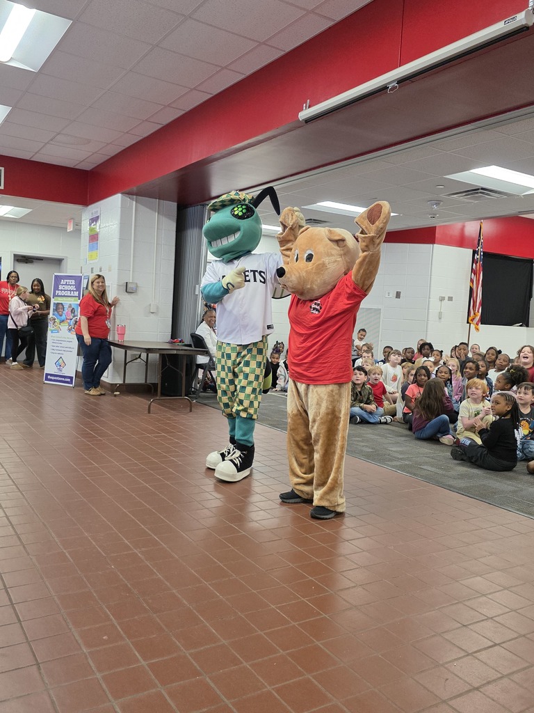 School mascots in front of crowd.