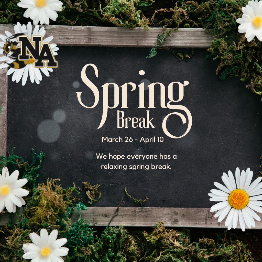 Chalk board with daisy and NA logo and moss.