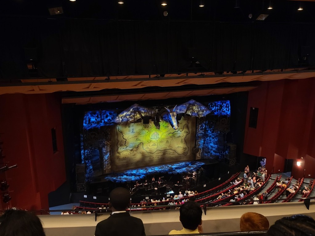 Stage of Wicked from upper section of a theater.