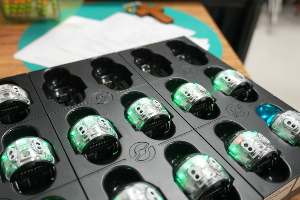 Little Robots in a tray ready to be used during Coding Camp.