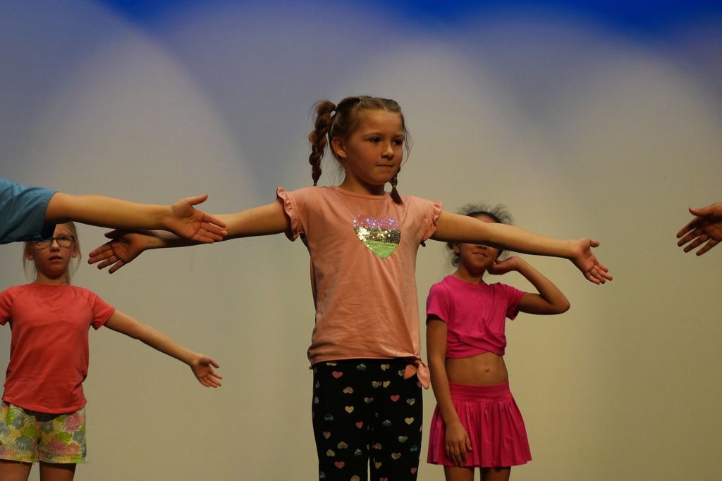 Student learning new dance moves. 