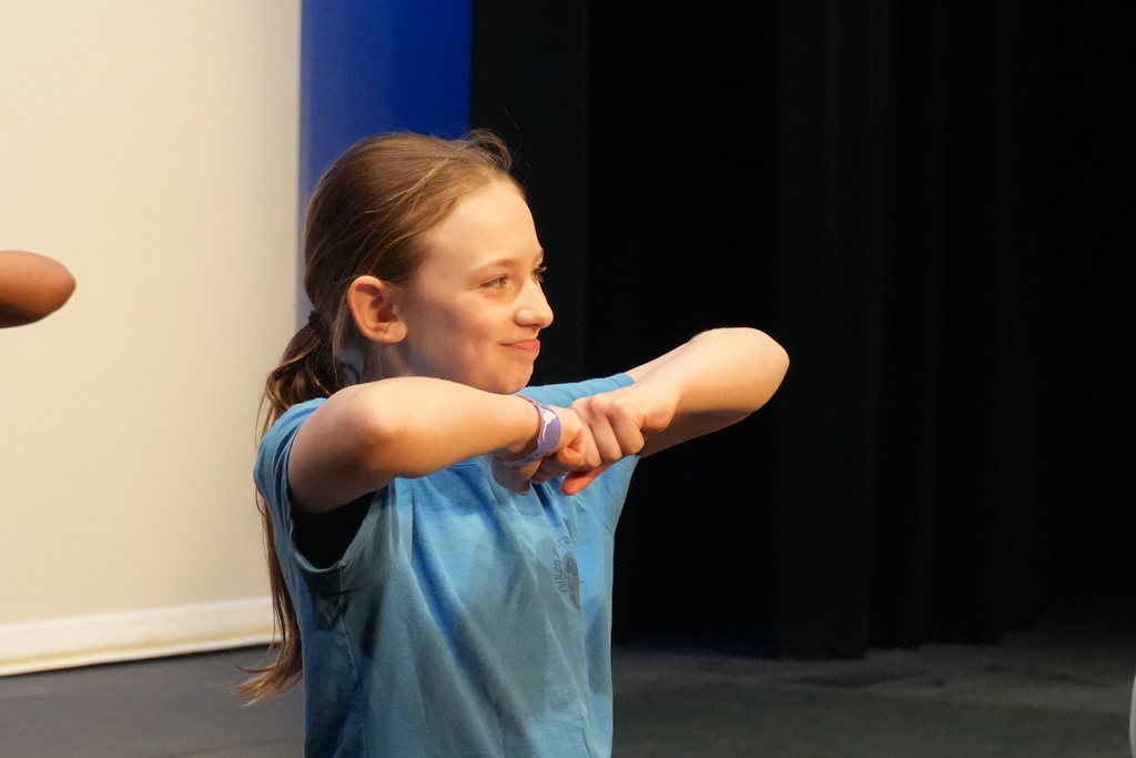 Student smiling during dance camp. 