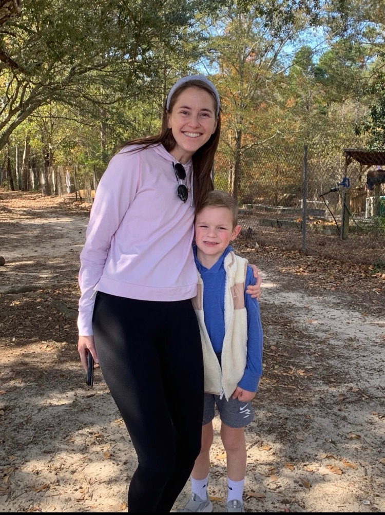 Mrs. Steelman steals a moment with her son.