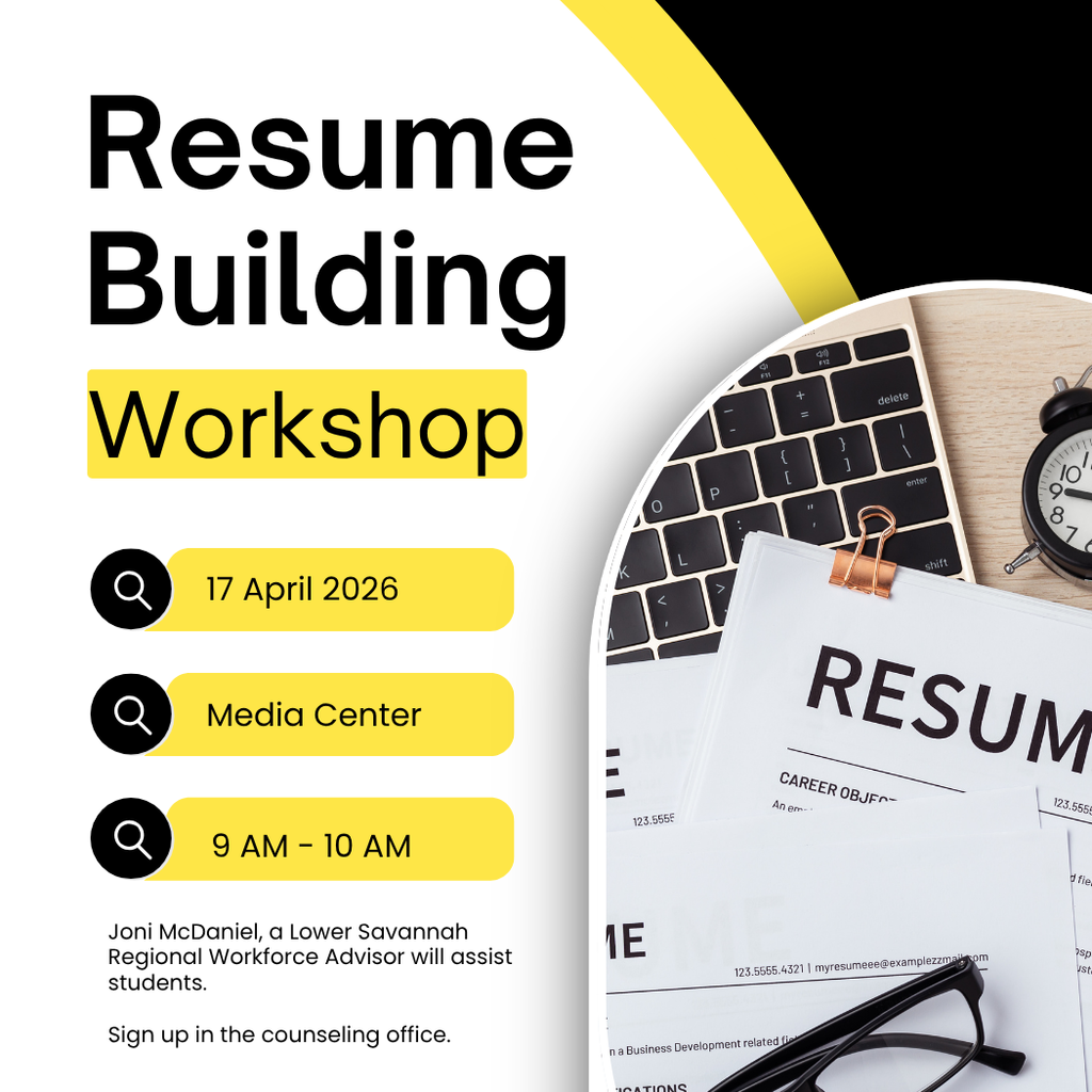 Resume and computer with glasses and clock.