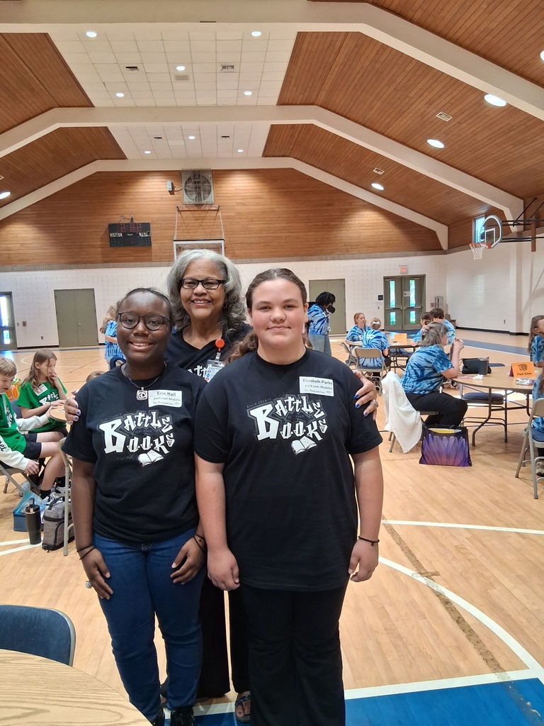 Bookmasters team and sponsor pose for a photo.