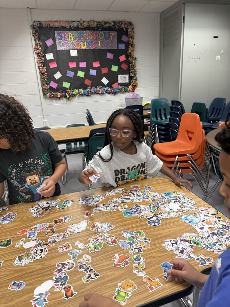 students picking out fun colorful stickers