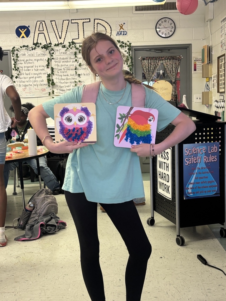 Student showing her artwork.