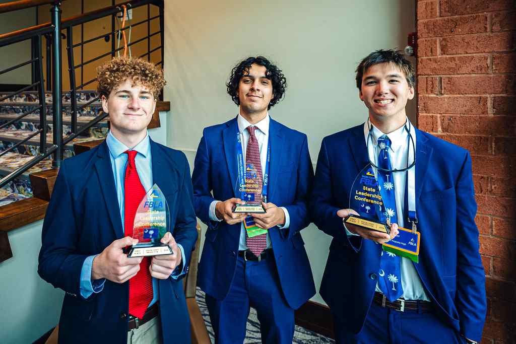 Students posing at convention. 