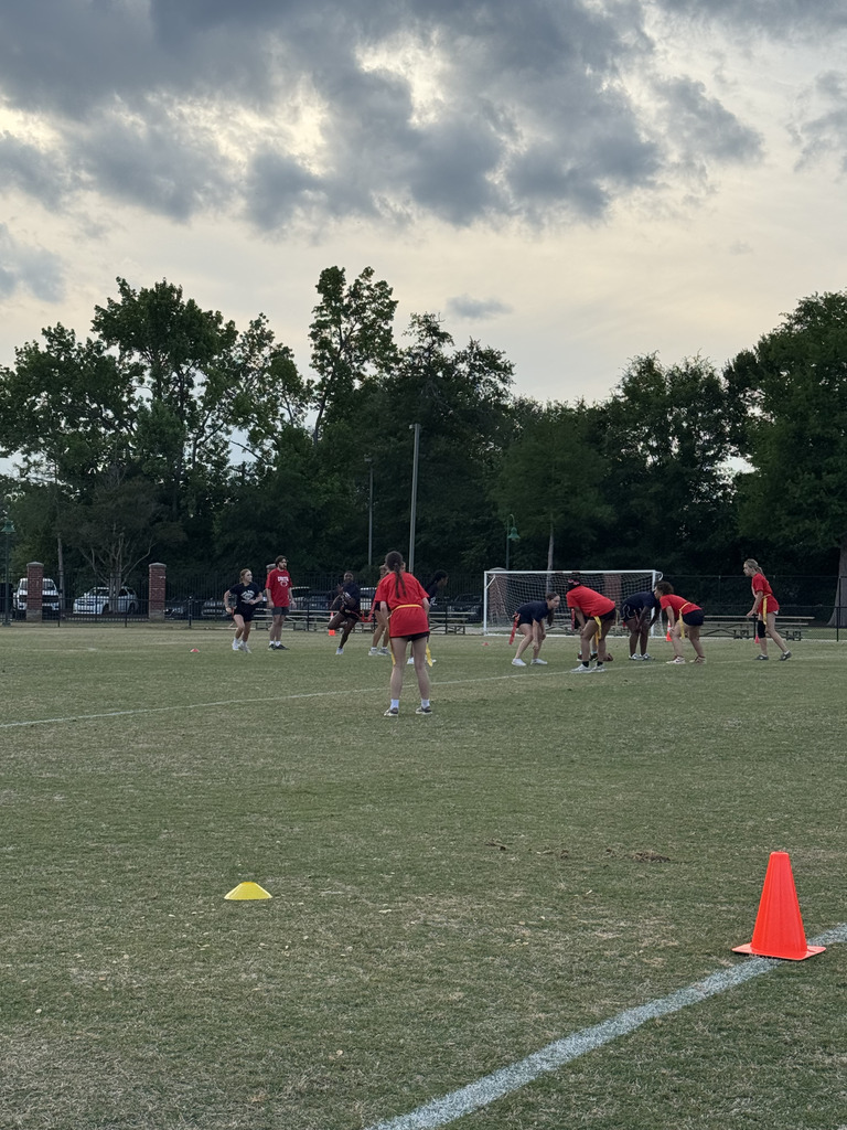 students playing powderpuff football