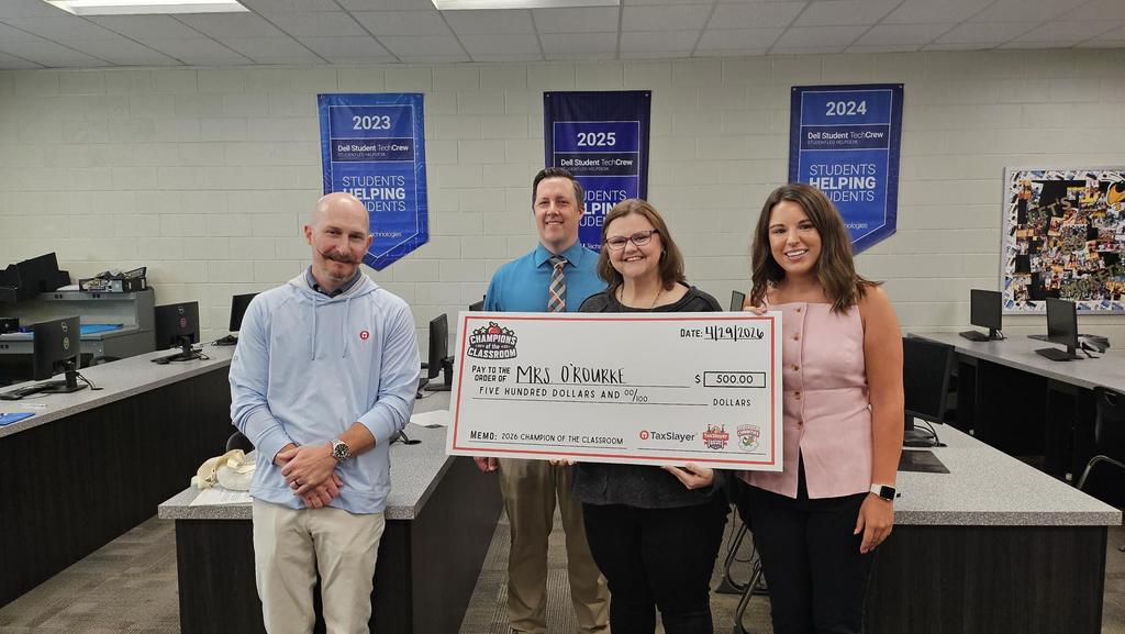 Dr. O'Rourke with representatives from Taxslayer and the Gator Bowl. 