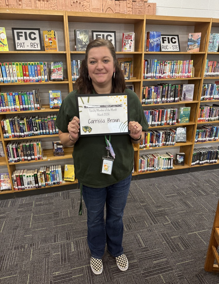 picture of a woman holding a certificate and posing 