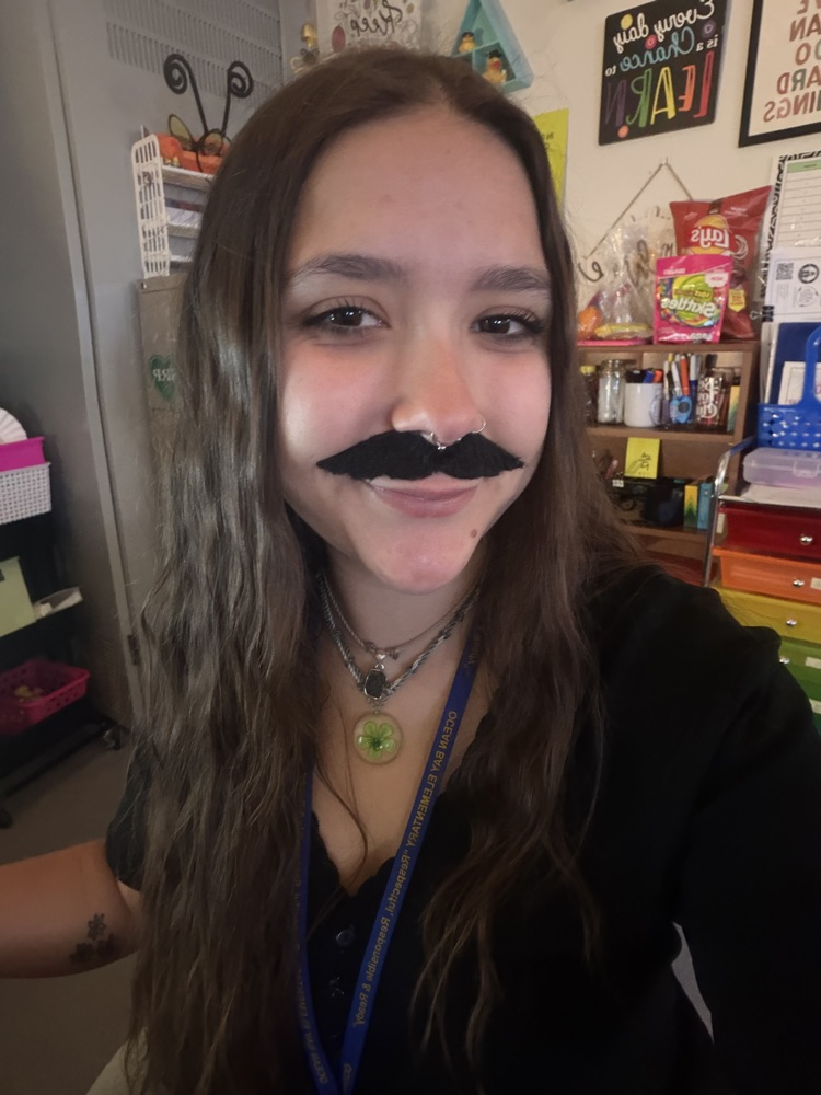 Teacher wearing a fake mustache