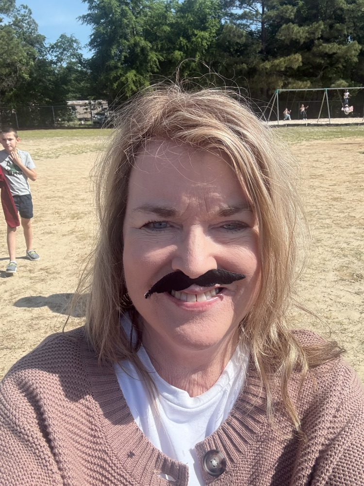 Teacher wearing a fake mustache