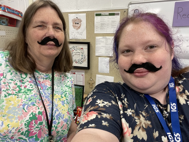 Teacher wearing a fake mustache