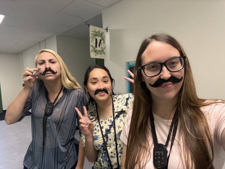 Teacher wearing a fake mustache
