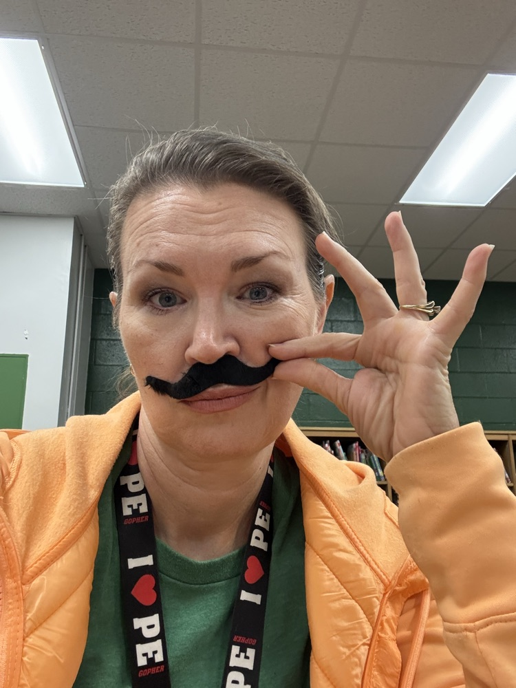 Teacher wearing a fake mustache