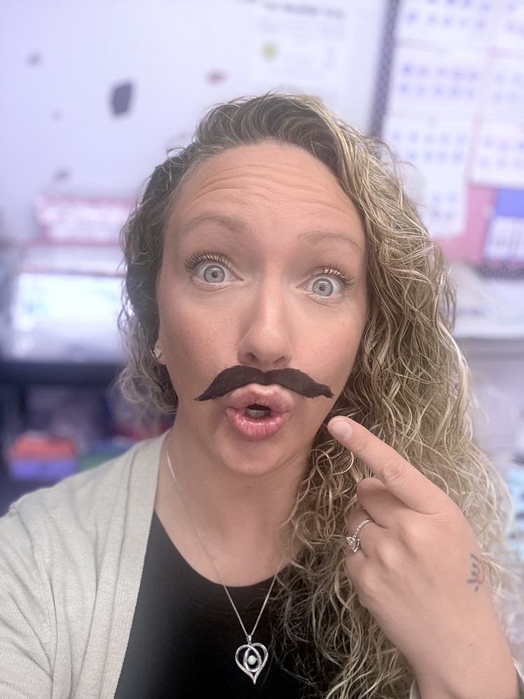 Teacher wearing a fake mustache