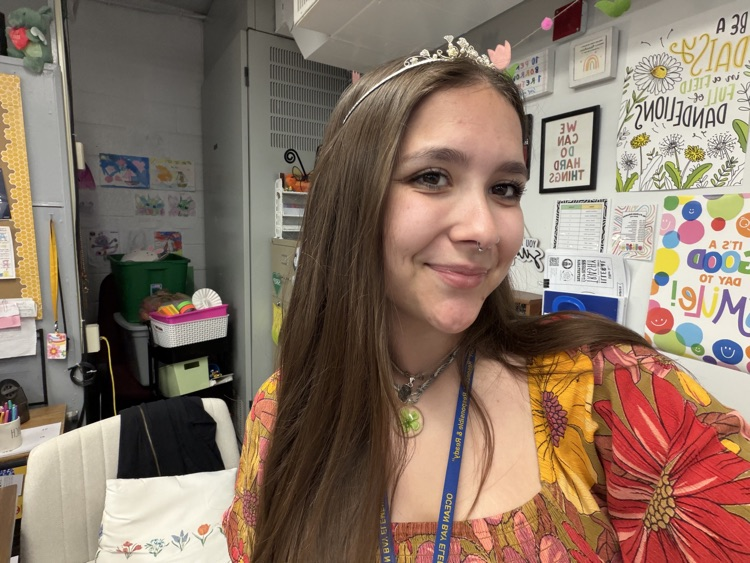teacher wearing a crown/tiara