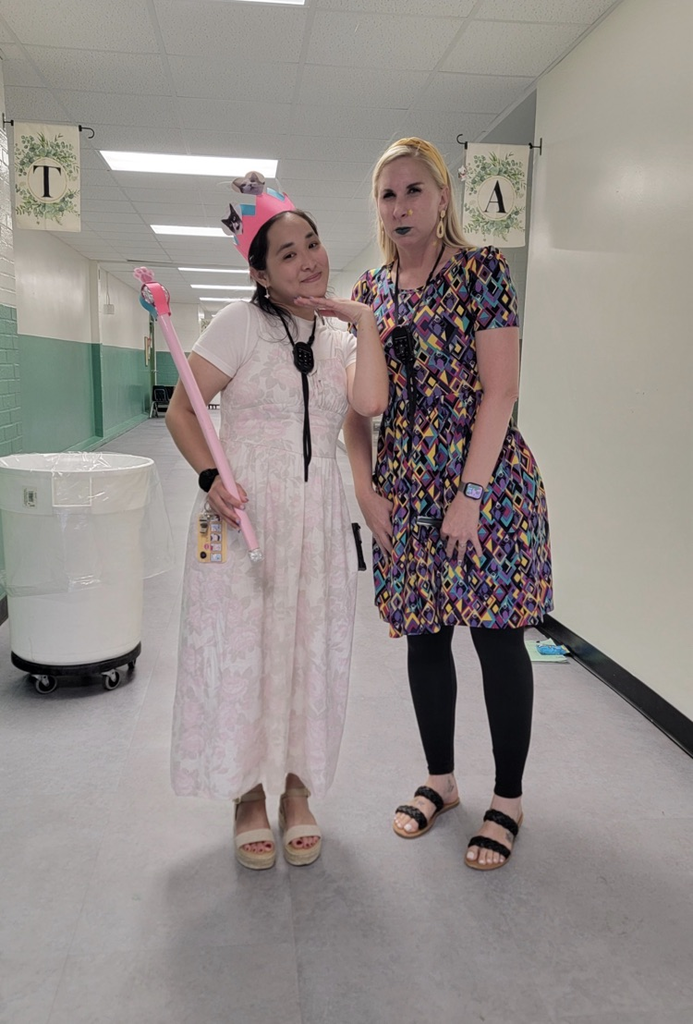 teacher wearing a crown/tiara