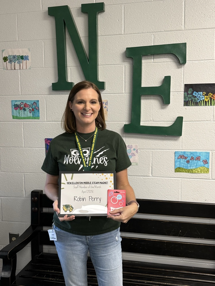 teacher holding certificate 