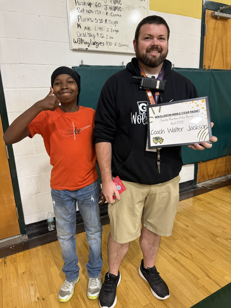 teacher holding certificate 