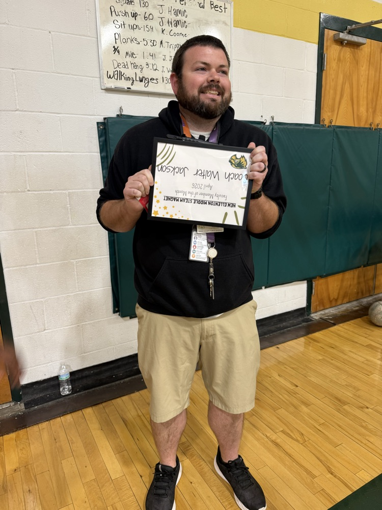 teacher holding certificate 