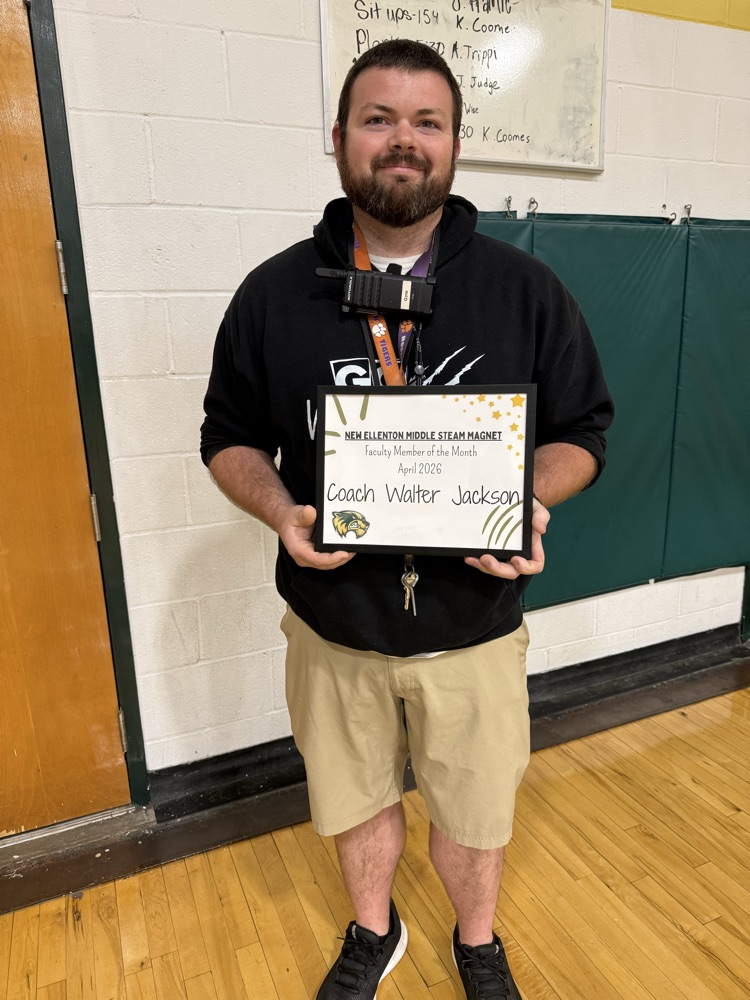 teacher holding certificate 