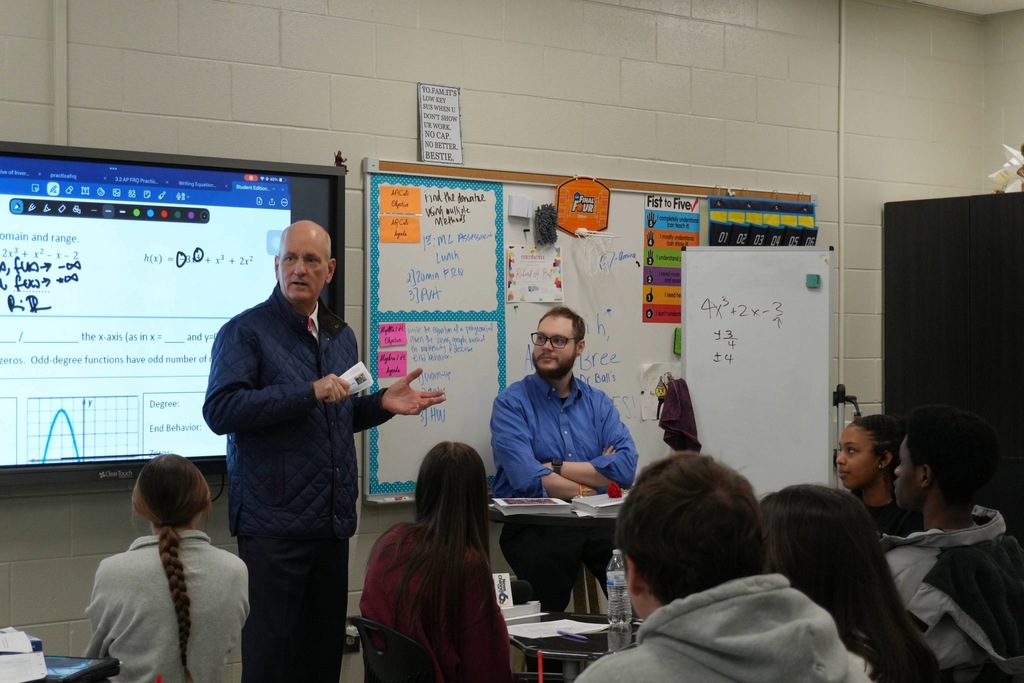 Dr. Richard Ball of North Augusta High School is surprised with a Golden Apple Award.
