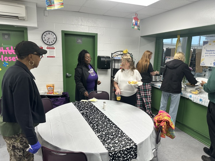 teachers in line to eat breakfast 
