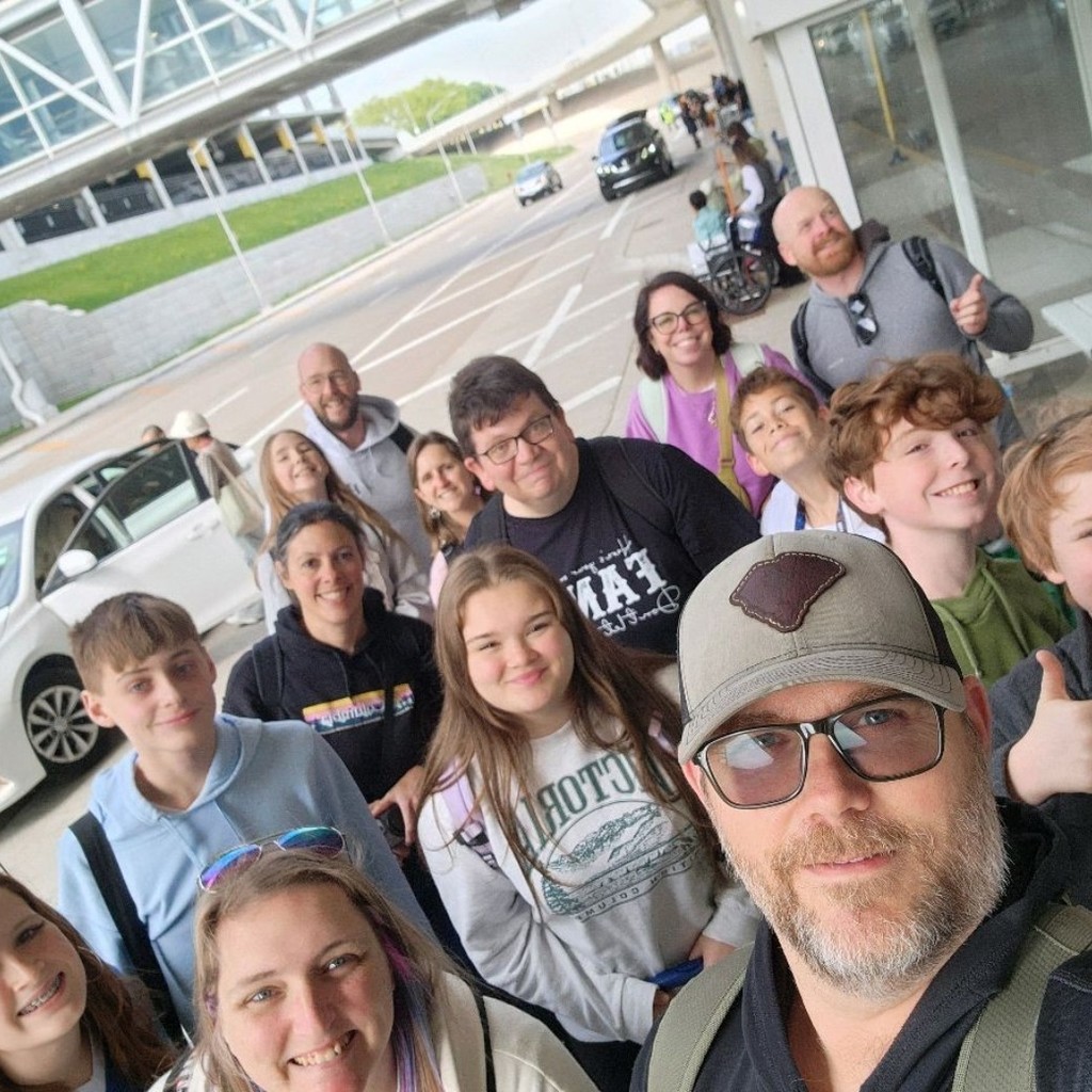group of tourists taking a selfie 